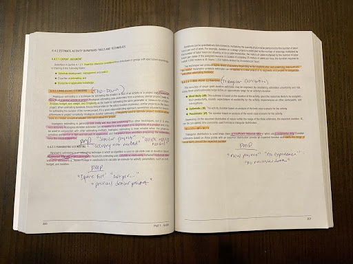 Notbook highlighted with yellow and pink color