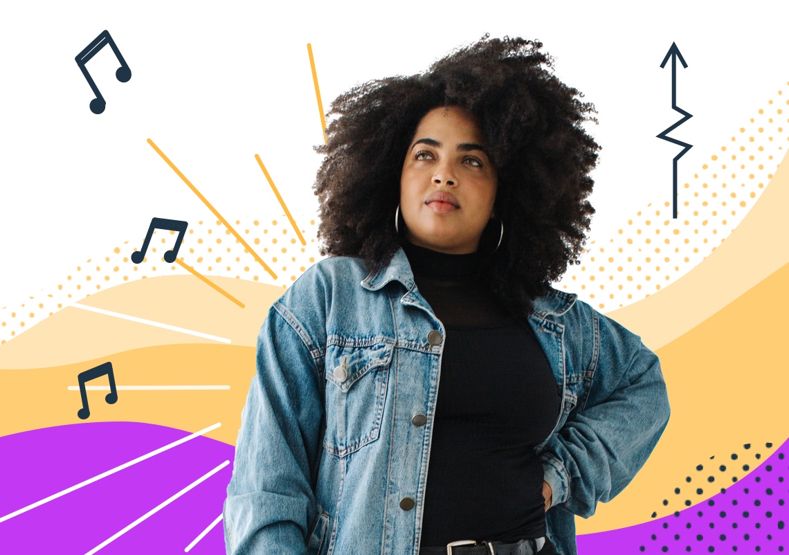 A young Black woman stands confidently wearing a denim jacket with her hand on hip. Purple and yellow color background.